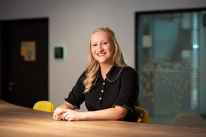 Lucy Johnson of North East LEP sitting at a desk